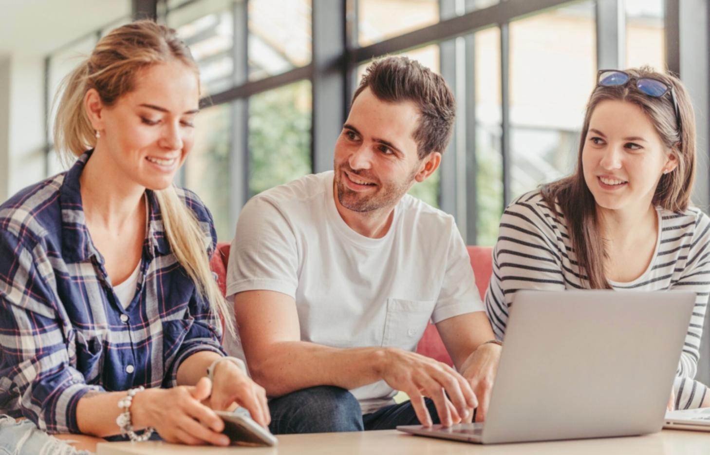 Students reviewing financial documents for visa application